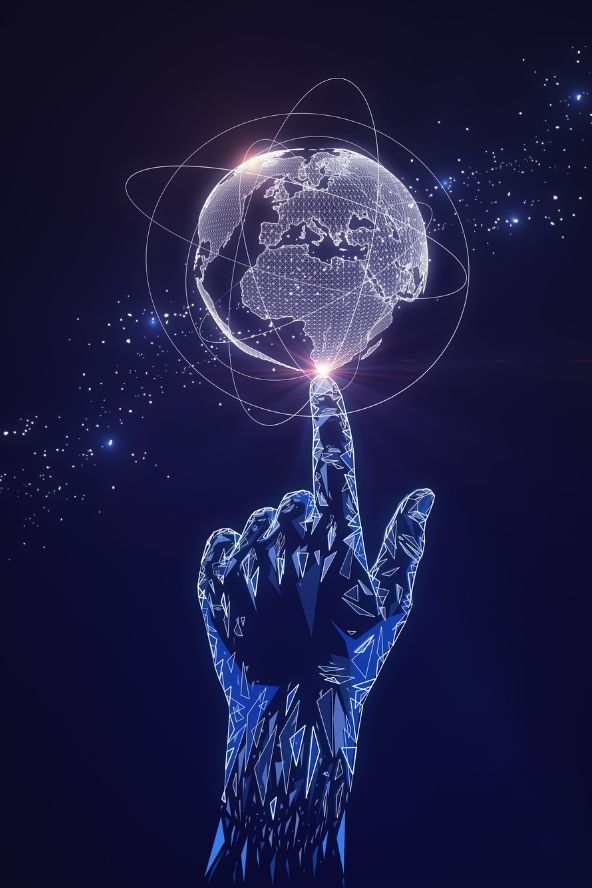 a hand touching a glowing globe