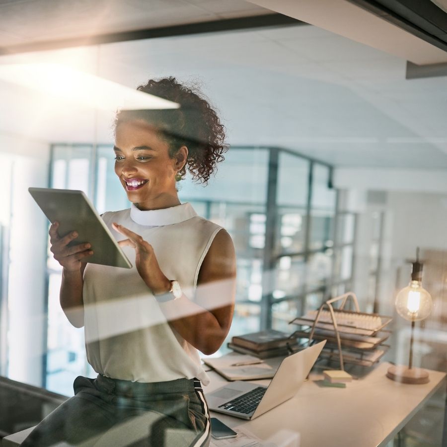worker using tablet computer in modern office