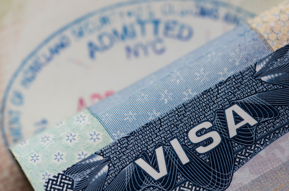 A closeup of a US visa stamp