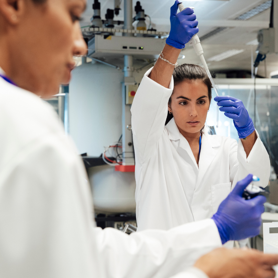 Female scientists carrying out a clinical trial
