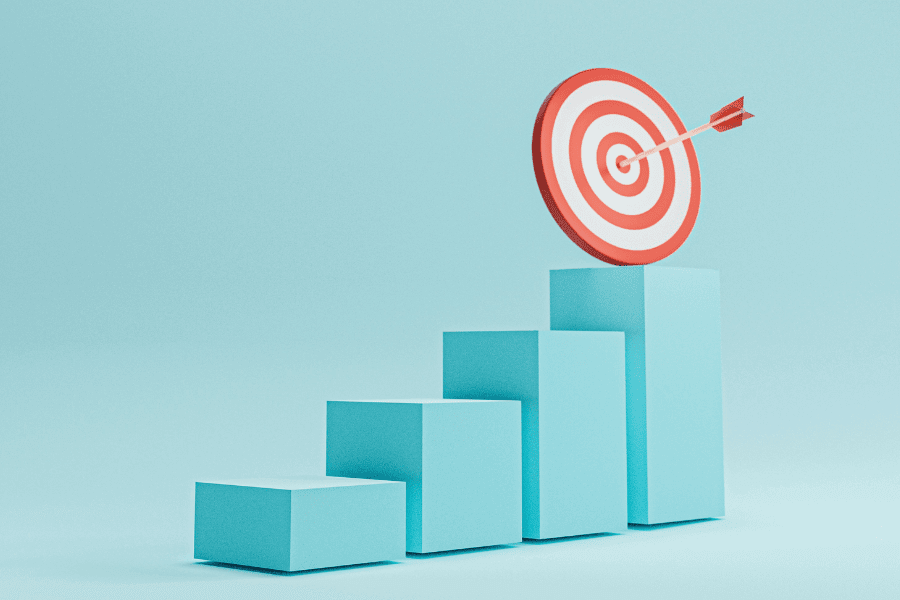 a target board atop a 3D blue bar chart