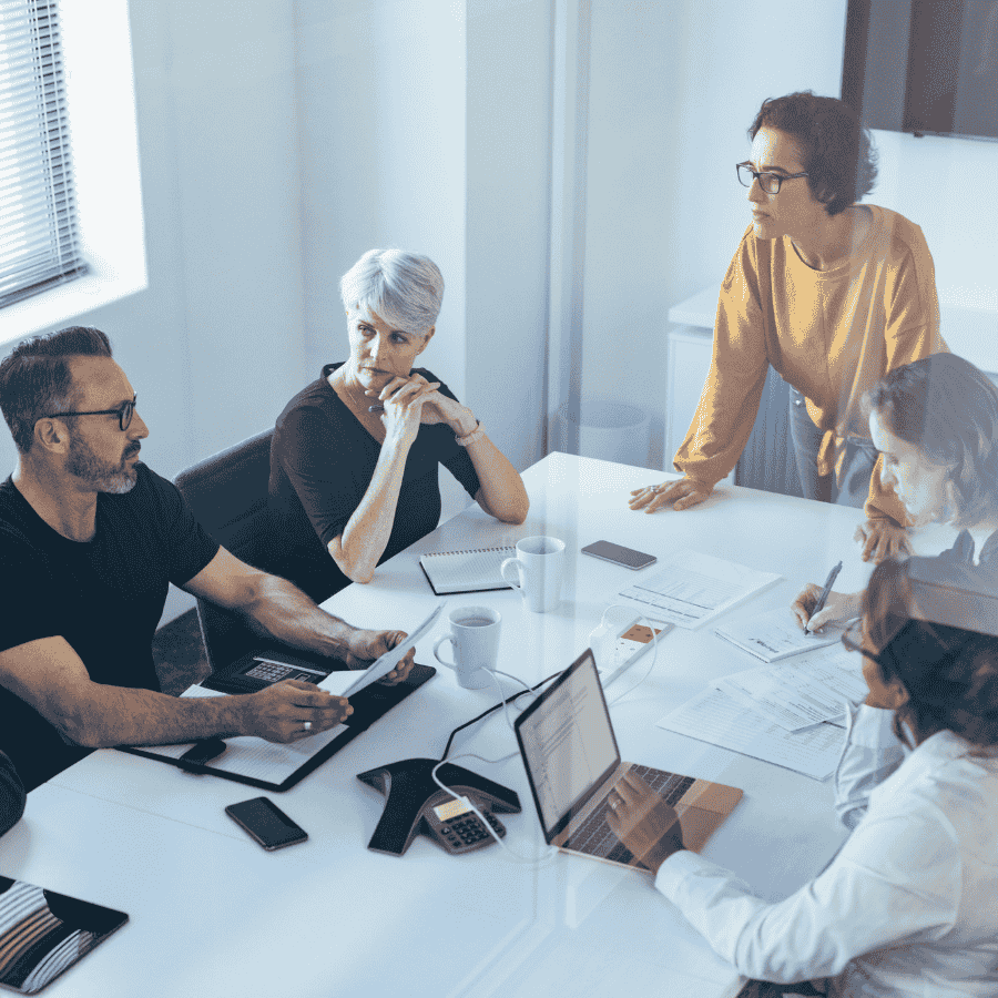 a team discussing data in an office meeting