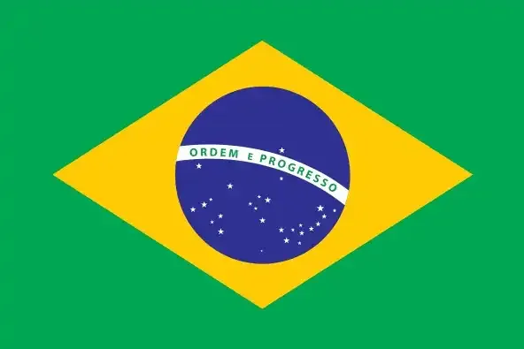 Flag of Brazil featuring a green field with a yellow diamond in the center, inside of which is a blue globe with white stars and a white banner reading 'Ordem e Progresso.'