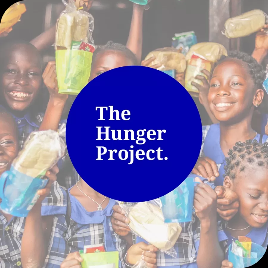 A 'The Hunger Project' circle logo over a white overlay and photo of children in an African country